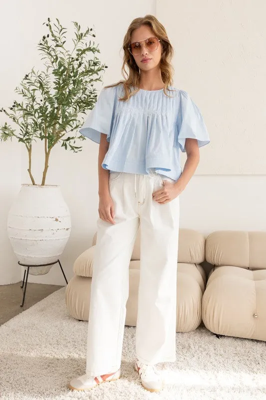 AZURE BREEZE PLEATED BLOUSE IN SKY BLUE