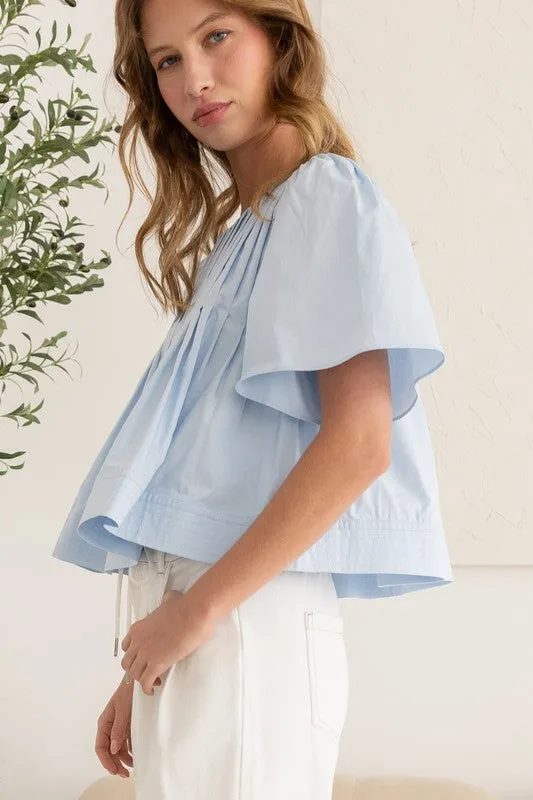 AZURE BREEZE PLEATED BLOUSE IN SKY BLUE