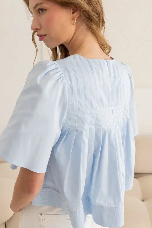 AZURE BREEZE PLEATED BLOUSE IN SKY BLUE
